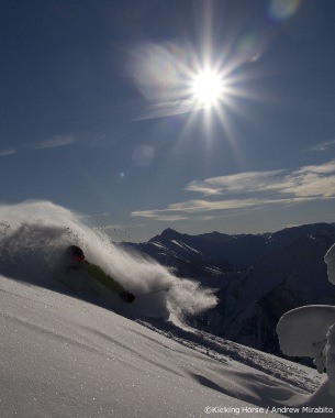 free riding in deep powder at kicking horse ski resort