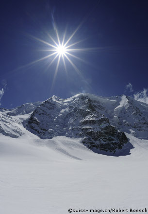 snow covered mountain peaks around st moritz ski resort