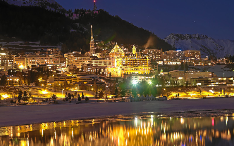 st-moritz ski resort, engadine at night over looking the lake